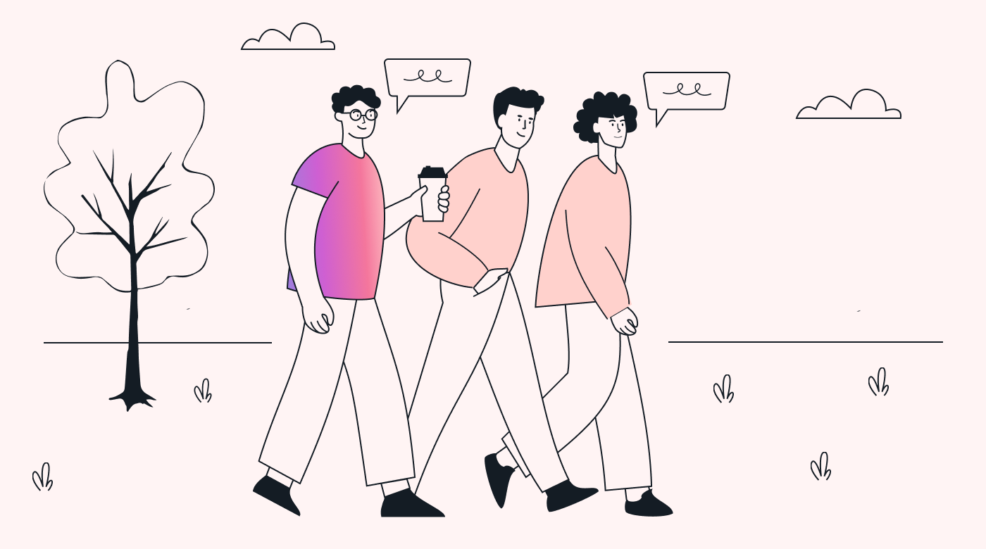 A group of employees walking and talking