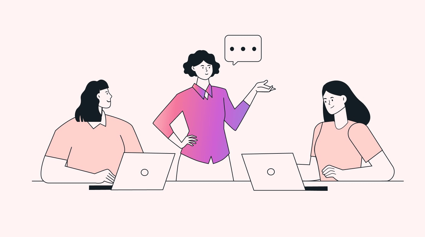 Three employees in a discussion